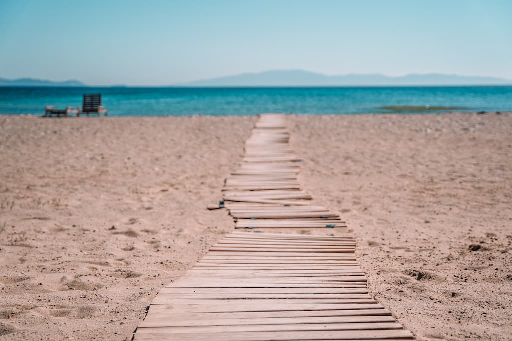 Renting a car in Naxos will give you the freedom to visit remote beaches such as Pyrgaki Beach.