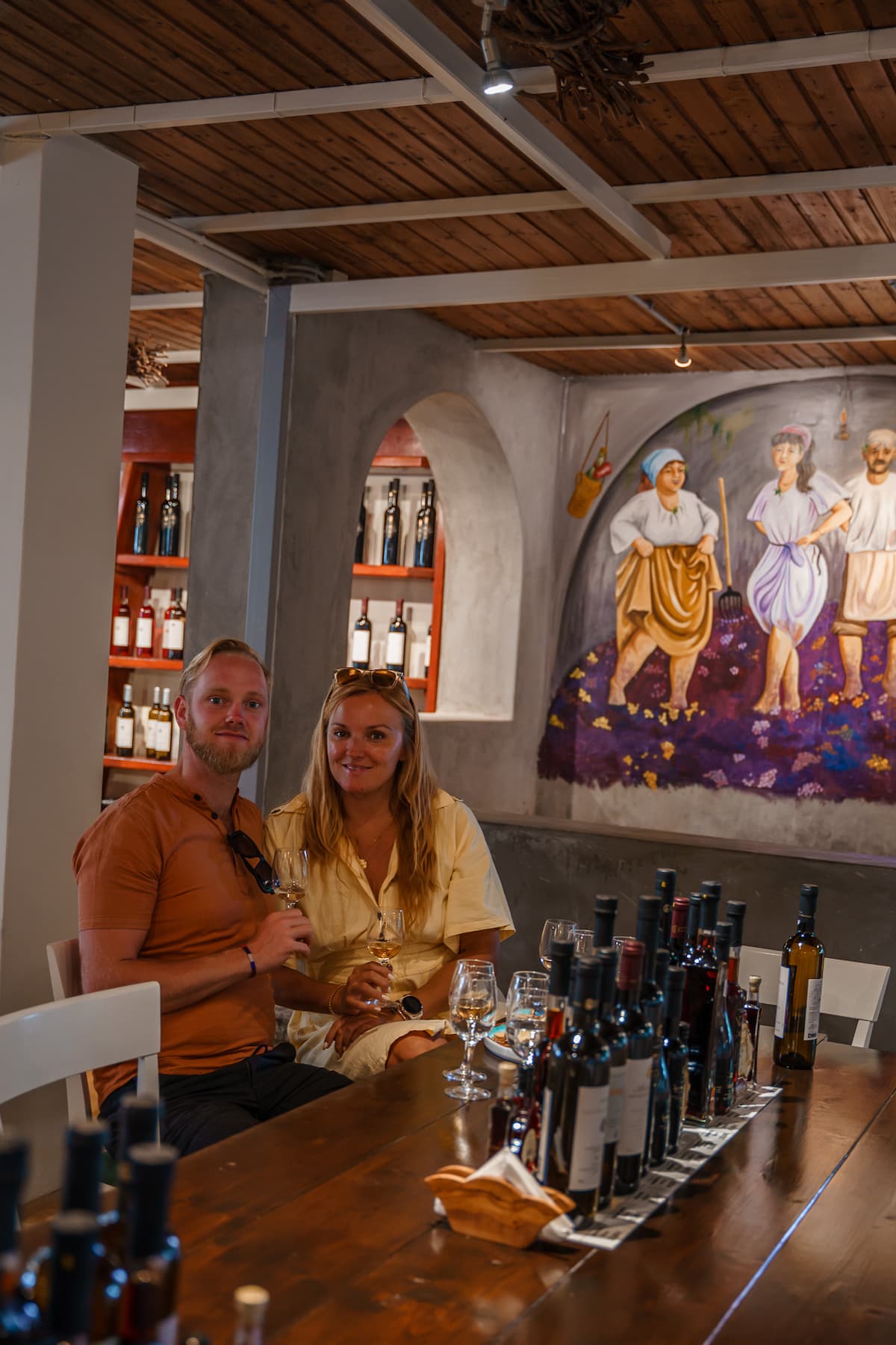 Bloggers Mal and Robin on a wine tour in Santorini.